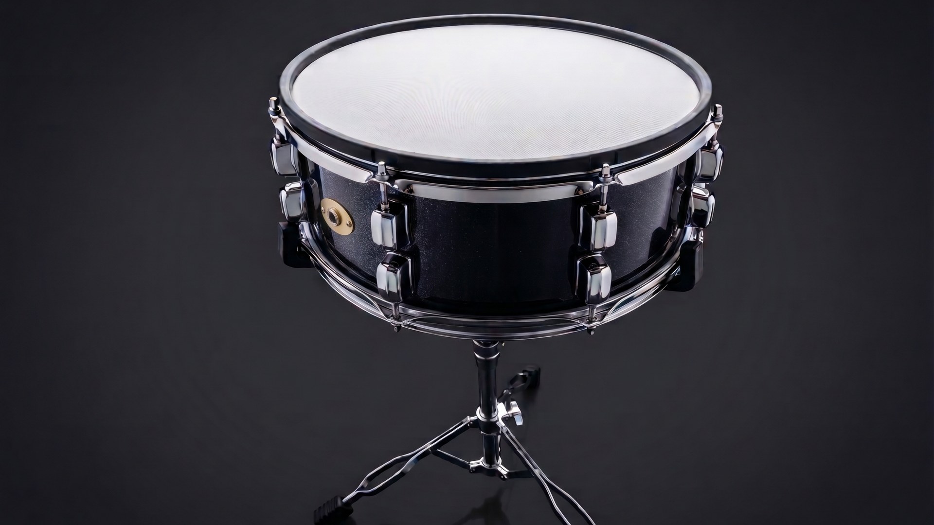 iDrum Dynamics 14 inch A2E snare with white mesh head and black sparkle shell on a chrome stand